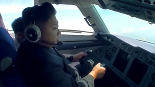 Watch the almighty Kim Jong-un allegedly flying a plane "by himself"